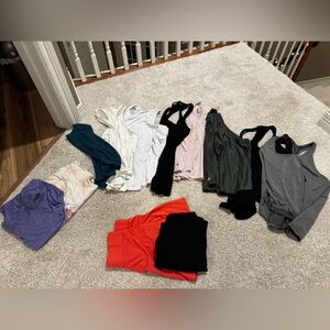 Lot of women’s tank tops size L-XL and skort, biker shorts